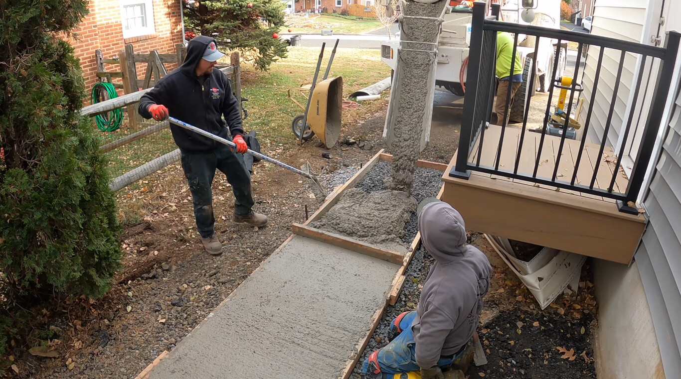 Concrete walkway installation with proper grading and finishing in Bridgeport, CT